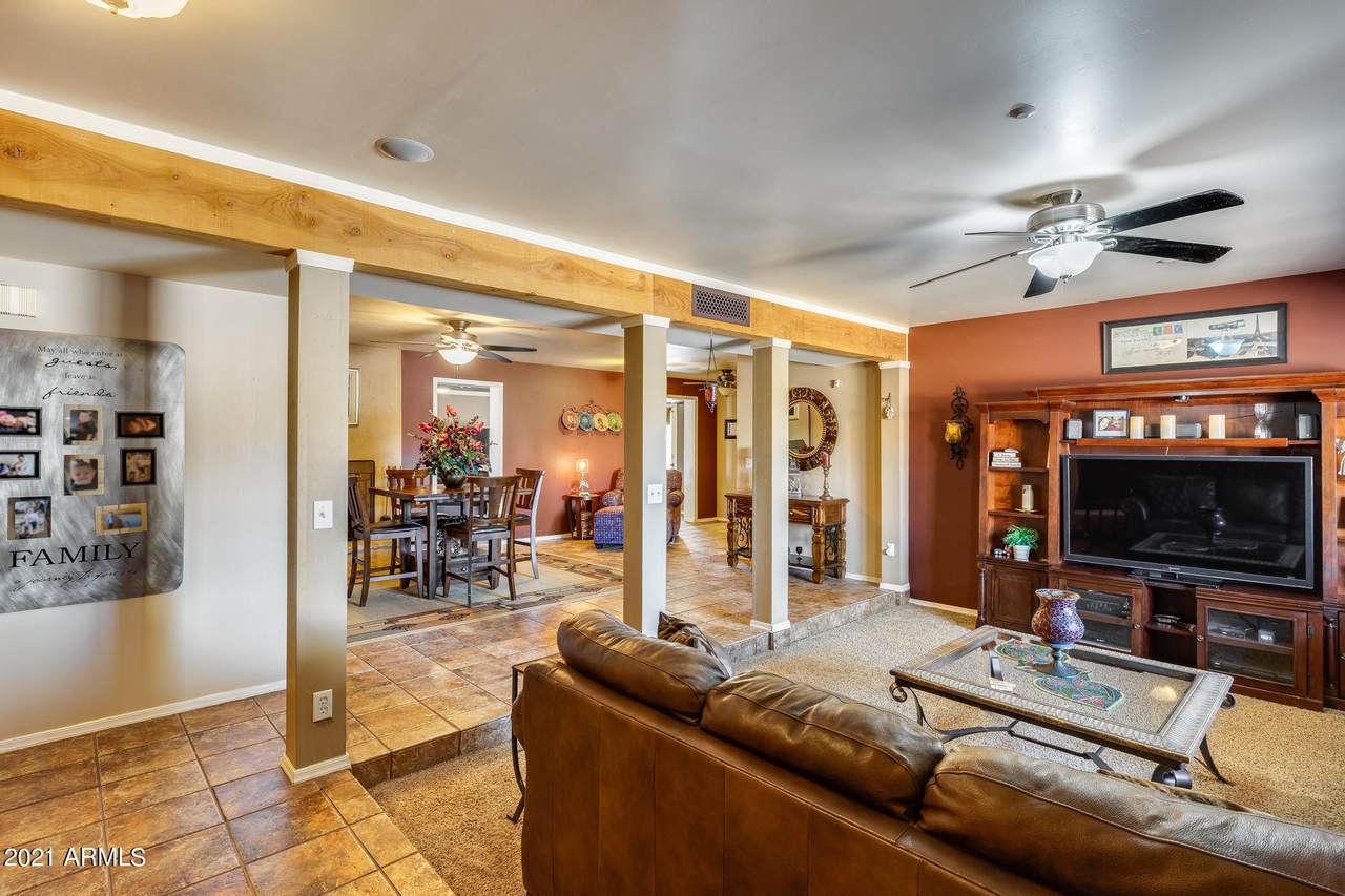 Interior of a Surprise, Arizona home with warm wood accents, tile floors and open living space